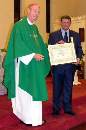 David Goodhind and Bishop Henderson holding the Bene Merenti Certificate